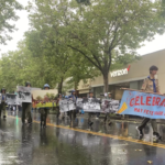 Picture showing parade in rain